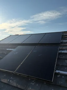 Solar panels installed on a residential rooftop during daylight